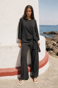 PANTALON LARGE EN MAILLE PLISSÉE